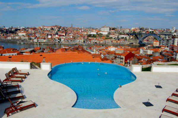 The decanter-shaped pool at the Yeatman Hotel in Porto carries out the wine theme 