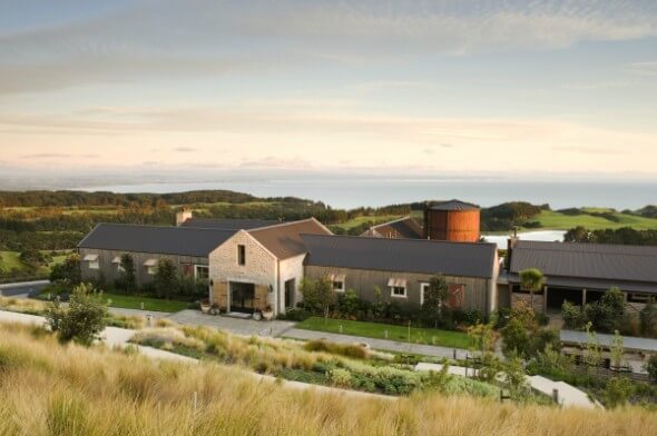 Front view of the Farm at Cape Kidnappers with its cluster of farm buildings