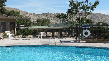 Some guest rooms are situated around the pool, others around the garden area