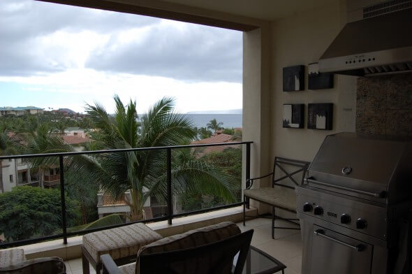 Lanai with grill and partial ocean view