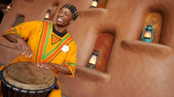 The African ambience is enhanced with performances in the Animal Kingdom Lodge lobby.