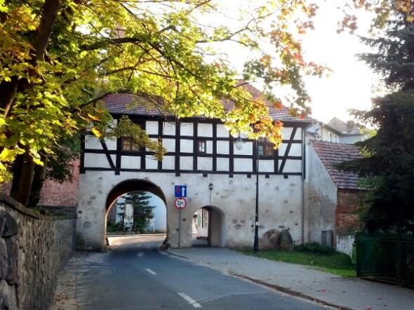 The road through the Lagow town gate leads to the Hotel Zamek Joannitow