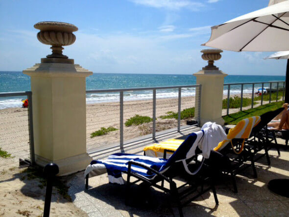 Lounge chairs facing the beach 