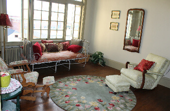 An upstairs shared space sitting room