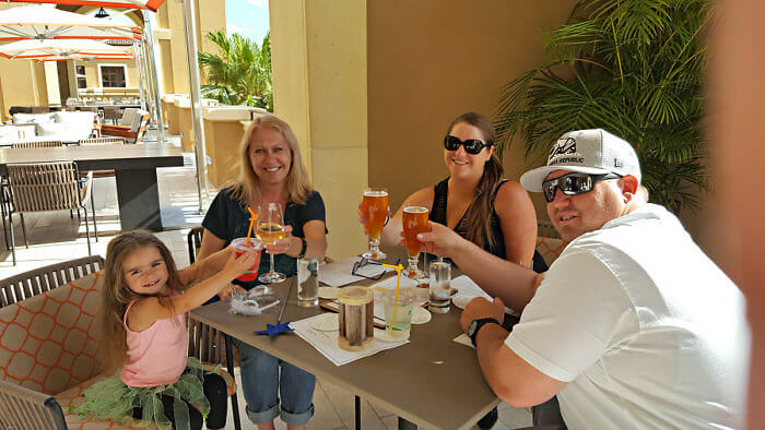 A toast to a Disney multigenerational family vacation at Four Seasons Resort Orlando at Ravello