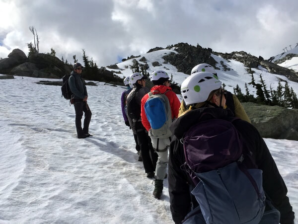 Hikers in the snow, Whistler BC Canada