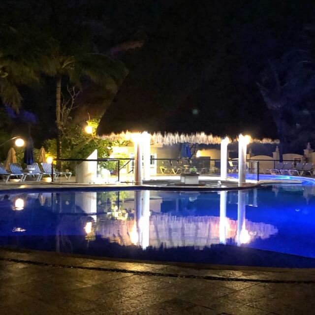 reef playacar pool at night