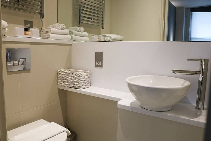 guest room bathroom at The Bull and The Hide: Boutique Stay in the Heart of London