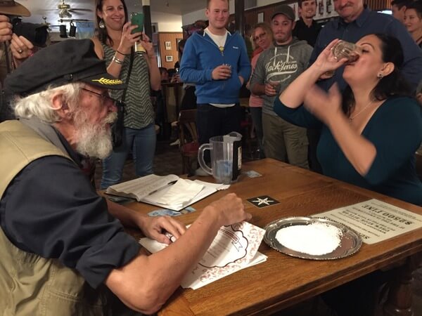 Drinking a Sour Toe Cocktail, Dawson City, Yukon Canada