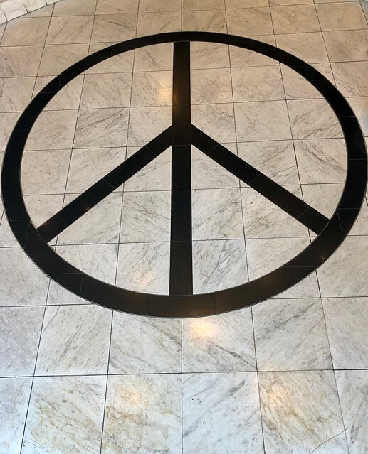 Hotel Shattuck Plaza Peace Sign symbol is embedded into the lobby floor.