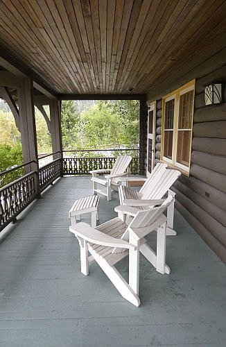 cottage porch at Belton Chalet, lodge, tap room, and restaurant by Glacier NP