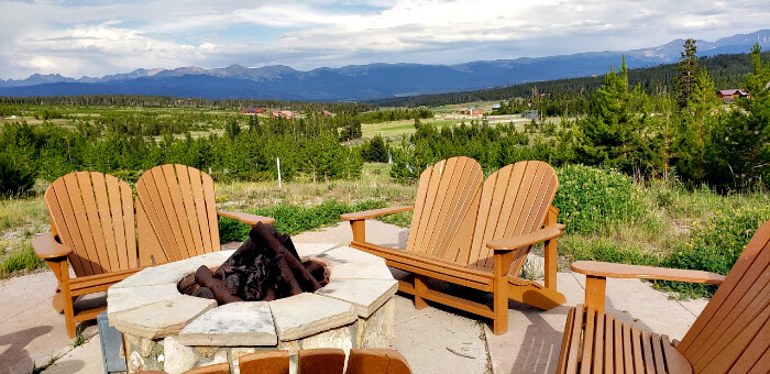 Firepit and playground near Indian Peak Lodge guest rooms. 