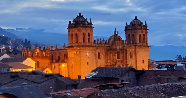 Dawn and lighted churches offer a colorful view of the city from hotel room