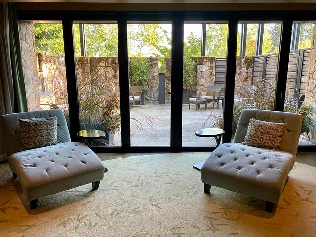 The quiet room has floor-to-ceiling windows at The Allison Spa.