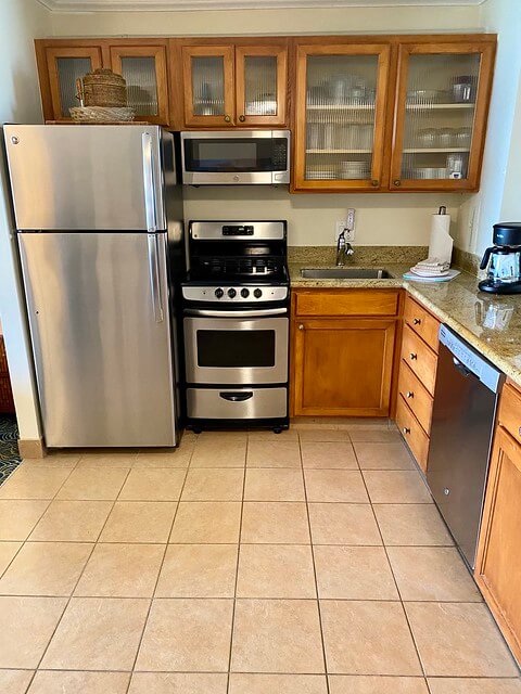 Napili Shores Maui kitchen with refrigerator, stove, microwave oven and dishwasher.