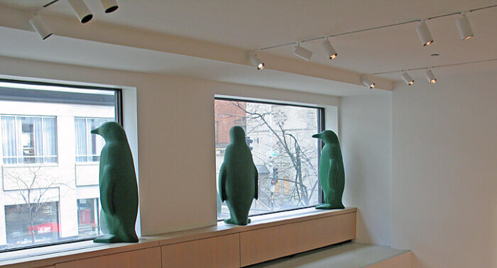 Evergreen penguins overlooking Ontario Street at 21c Museum Hotel