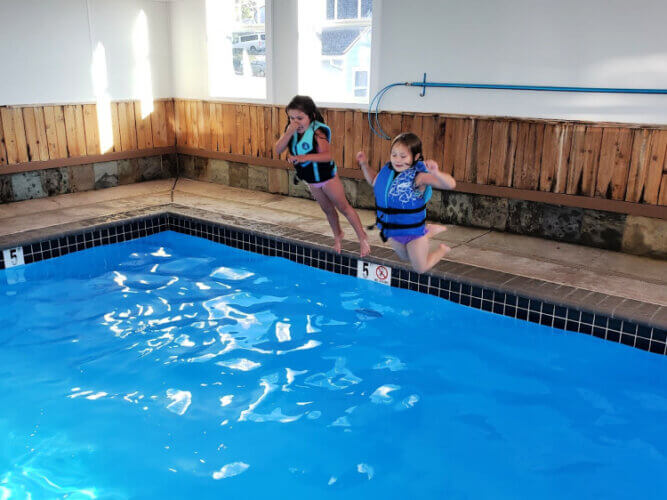 Hotel-Scoop writer's granddaughter and friend enjoying the pool at the Waves Hotel, Newport, Oregon. 