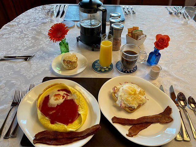 Gourmet stay in Oregon starts with Dutch Baby pancake and Croque Madame, orange juice, French press coffee and homemade Baileys cream.