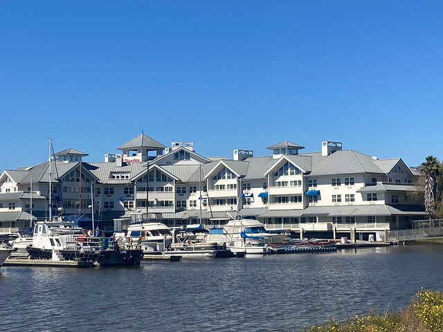 Sheraton Sonoma Wine Country in Petaluma is located on the water with boats in the marina. 