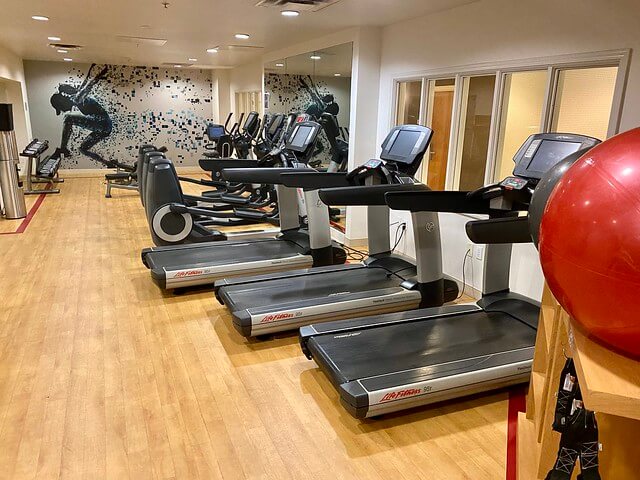 Three treadmills and multiple recumbent bikes, as well as dumbells in the Sheraton Petaluma fitness center.