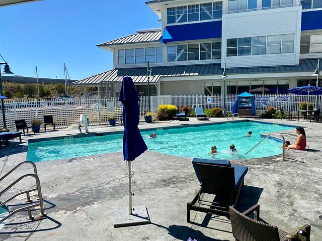 Sheraton Sonoma Wine Country outdoor pool with several hotel guests.