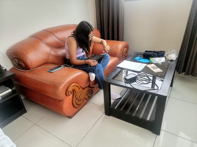 Young girl on couch in Matrimonial Suite