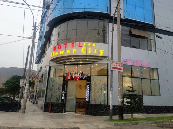 Exterior photo of Hotel Flower City at Twilight