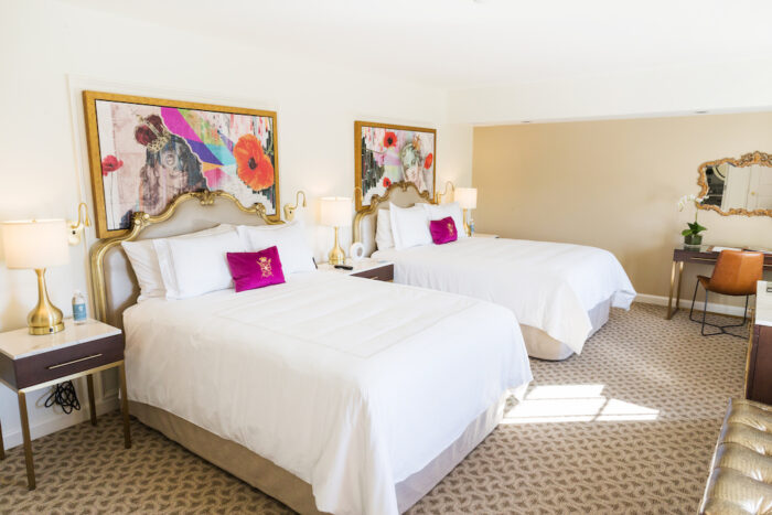 bedroom with two queen beds Cavalier Hotel