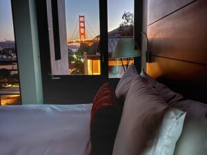 Bed in Cavallo Point Guestroom with Golden Gate Bridge in Background