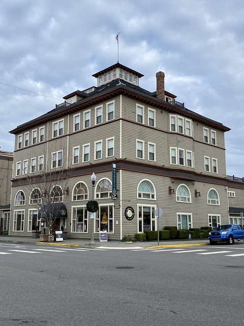 Exterior view of the 5-story Majestic Inn & Spa, complete with a copula on top.