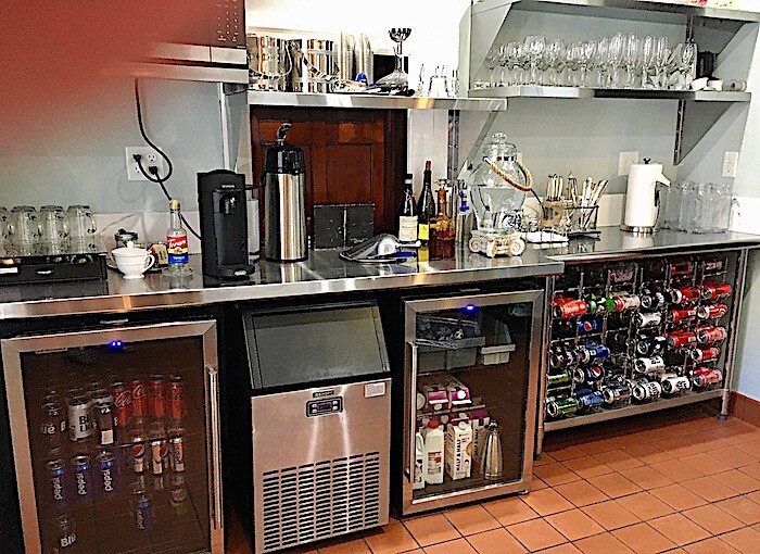 Pantry with beverages and snacks.