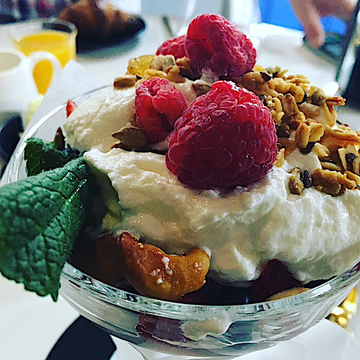 Breakfast fruit bowl with yogurt.