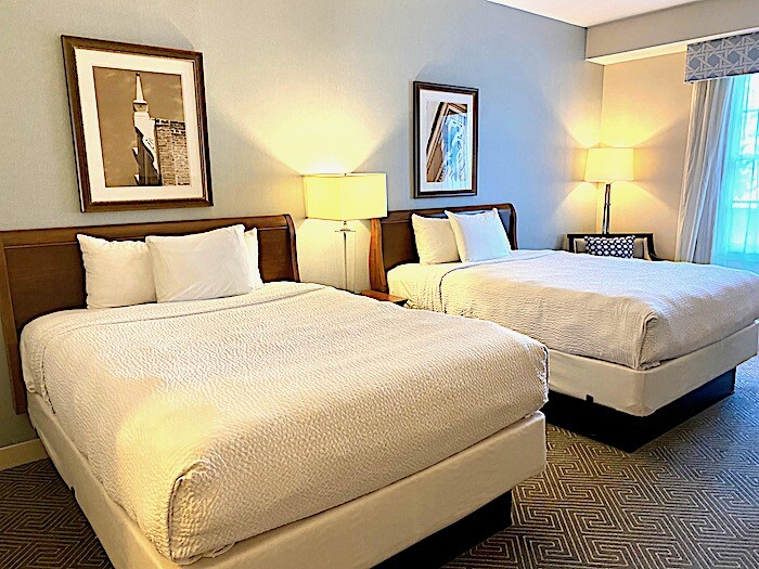 Comfortable guest room with two beds.