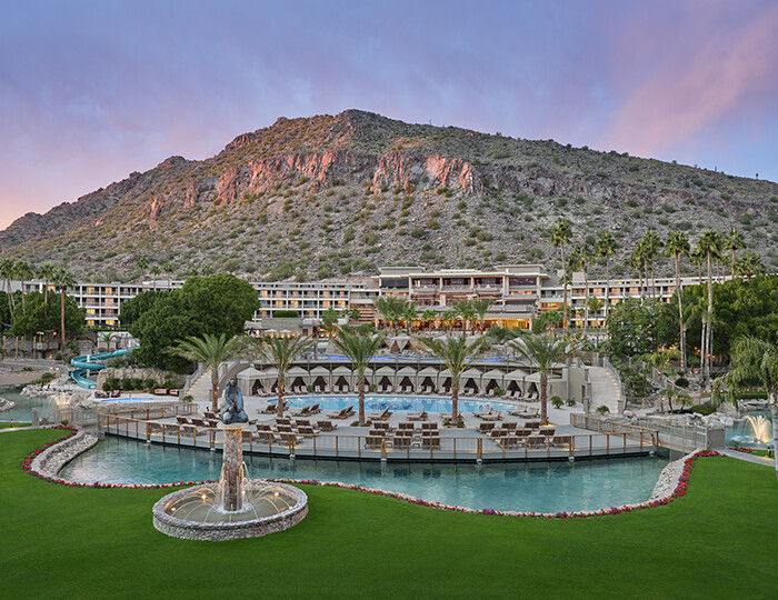 Overview of Phoenician resort with pools and grassy lawn