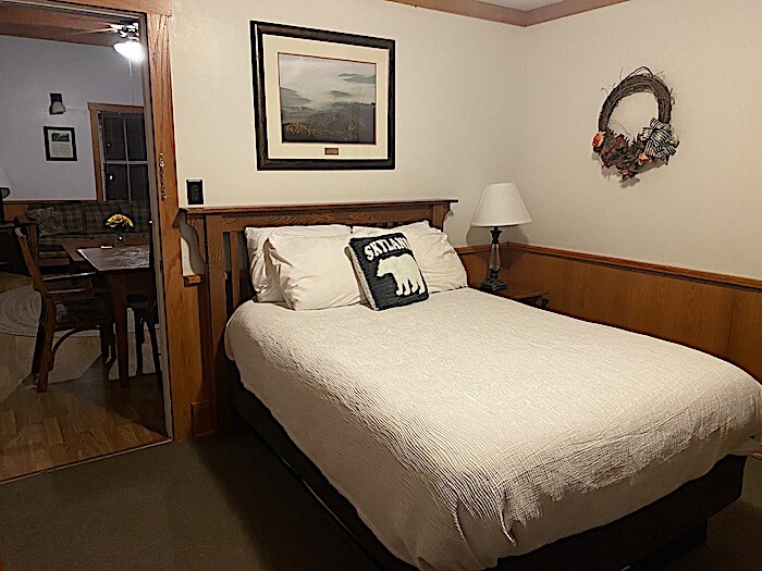 A bedroom in a Skyland Resort cabin.