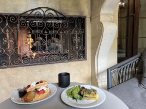 Breakfast by outdoor fireplace at Kenwood Inn & Spa