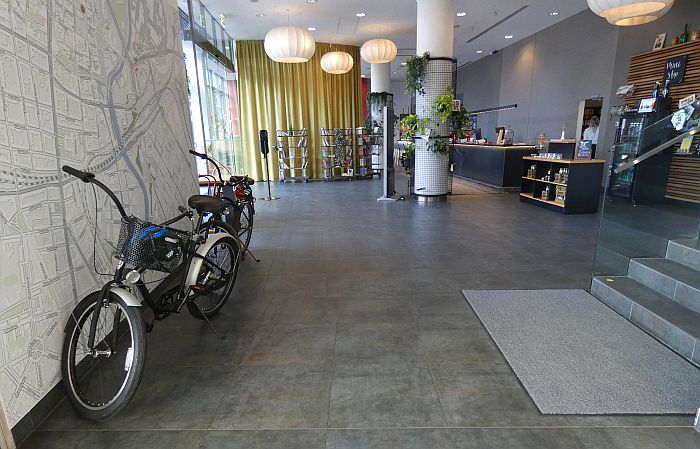 lobby at Vienna House Easy with bikes