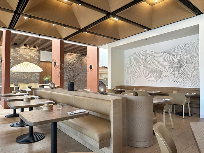 Soft taupes and black accents are on display in the restaurant