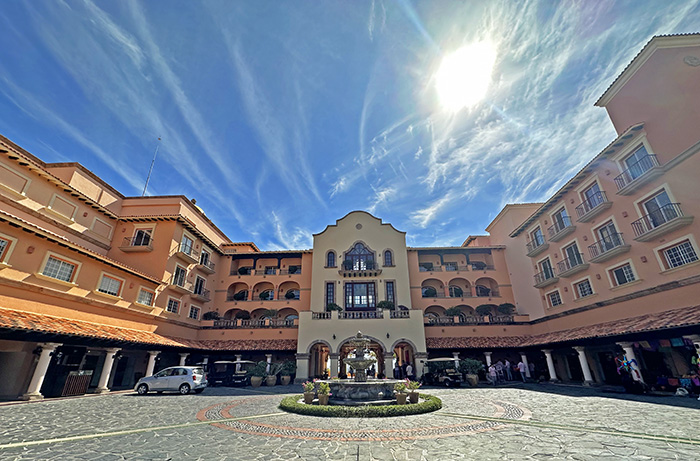 The motor court and main mission style building of Hacienda del Mar resort