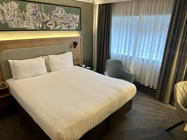 Holiday Inn London Regents Park premium double hotel room with white sheets and 4 white pillows. 