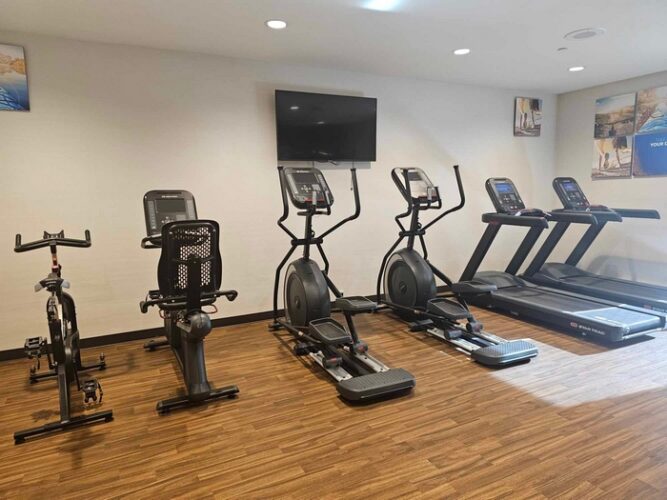 Gym workout equipment with treadmills and ellipticals at Holiday Inn Express in Bernalillo, New Mexico