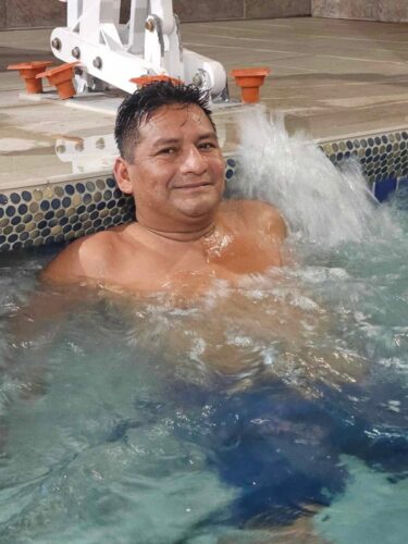 Hispanic male in hot tub at Holiday Inn Express in Bernalillo, New Mexico