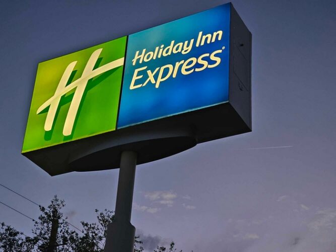 Exterior Sign that reads: Holiday Inn Express in Blue & Green Logo