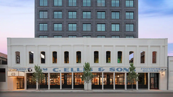 Exterior view of hotel showcasing historic building and modern tower