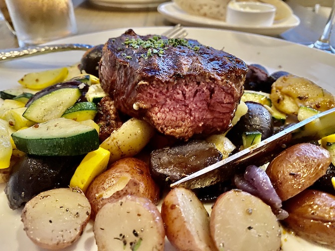 Filet mignon and seasonal vegetables was delicious.